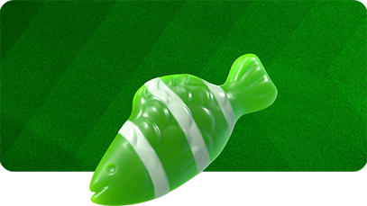 A green fish-shaped candy with two white stripes, displayed against a green diagonal-striped background.