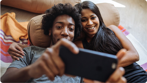 Two people taking a selfie.